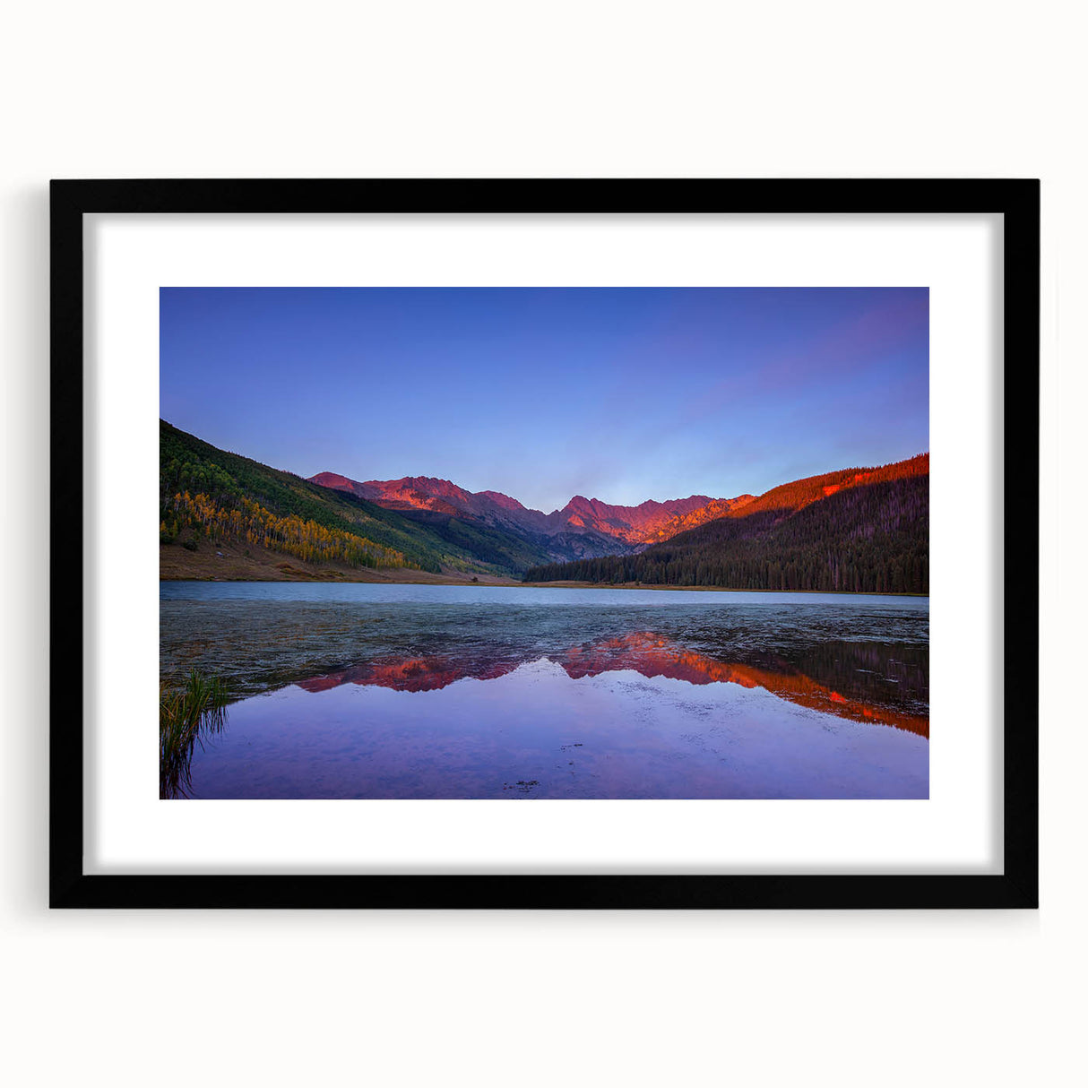 Extra large abstract art print of vibrant Colorado scenery on textured canvas, framed in black, ideal for living room decor.