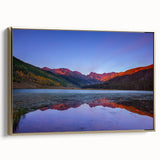 Framed canvas wall art featuring a vintage-style landscape painting of Vail, Colorado, in muted gold and black tones.