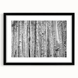 Colorful abstract art print of Aspen scenery in vibrant hues on a large, framed canvas, ideal for living room decor.