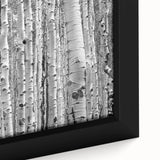 Extra large framed canvas featuring a textured depiction of an Aspen landscape in black with colorful highlights.
