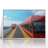 Acrylic print of Pikes Peak, Colorado with soft pastel shades, framed in white, ideal for modern nursery wall art.