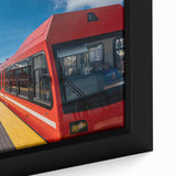 Black wall art featuring a textured depiction of Pikes Peak in vibrant colors on a framed canvas.