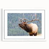 Abstract art print of the Rocky Mountains in muted earth tones on a framed white mat, ideal for bedroom or dining room decor.