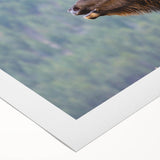 Art deco poster of the Rocky Mountains in muted earth tones on rolled canvas, suitable for dining room decor.