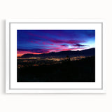 Abstract art print of Colorado Springs in muted earth tones on a framed white mat, suitable for dining room decor.