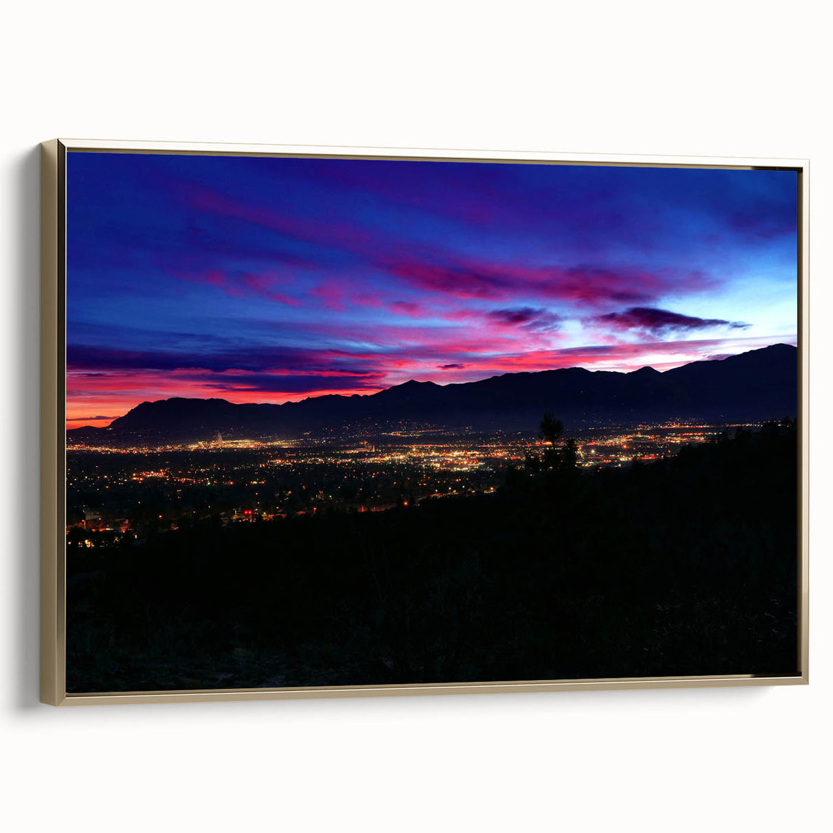 Framed canvas wall art of Colorado Springs landscape in vintage poster style, featuring muted earth tones.