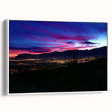 Vintage poster art of Colorado Springs with colorful landscape on white-framed canvas.