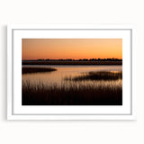 Abstract art print of Connecticut scenery in muted green and blue tones, framed with a white mat.