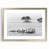 Textured abstract art print depicting the Everglades in muted green and blue tones, framed in silver.