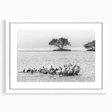 Abstract art print of the Everglades in muted green and blue tones on a framed white mat, suitable for dining room decor.