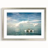 Textured abstract art print of Florida Keys scenery in muted blue and green tones, framed with a silver mat.