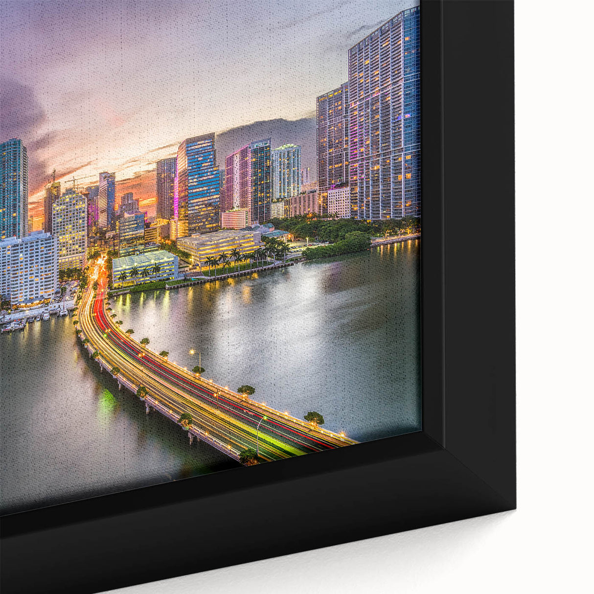 Black wall art featuring a textured depiction of Miami with vibrant colors on a large framed canvas.