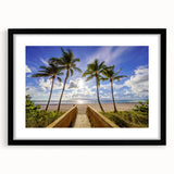 Abstract art print of Florida palm beach in vibrant colors on a large framed canvas, suited for living room decor.