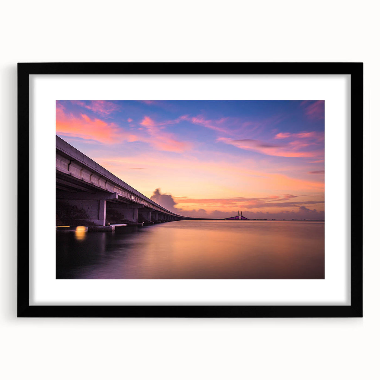 Abstract art print of a colorful Tampa skyline, featuring textured brush strokes in vibrant hues on a large framed canvas.