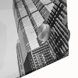 Large abstract depiction of the Atlanta skyline in muted gray and blue on acrylic glass, suitable for dining room art.