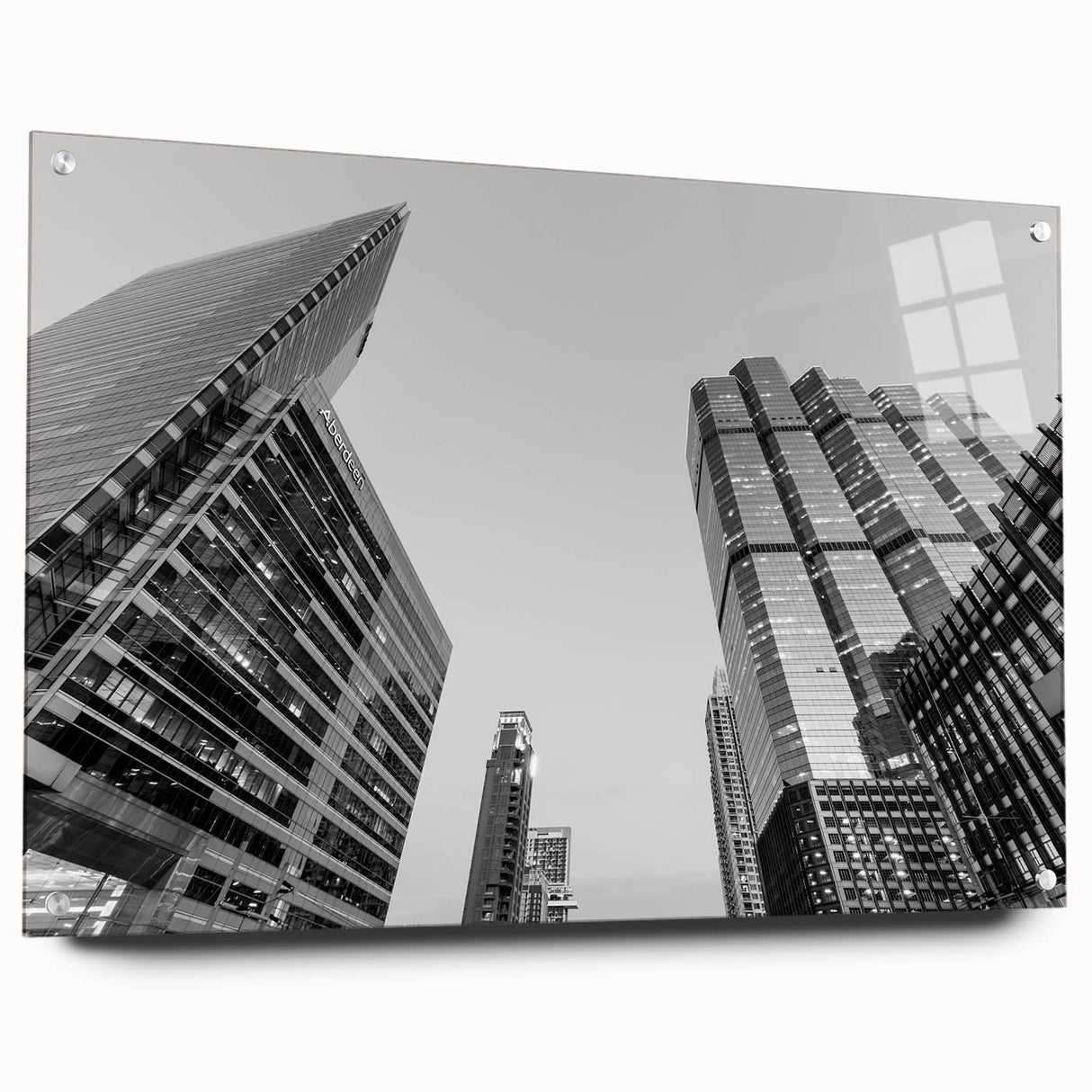 Acrylic print of Atlanta skyline in muted grays and blues, suitable for modern dining room decor.