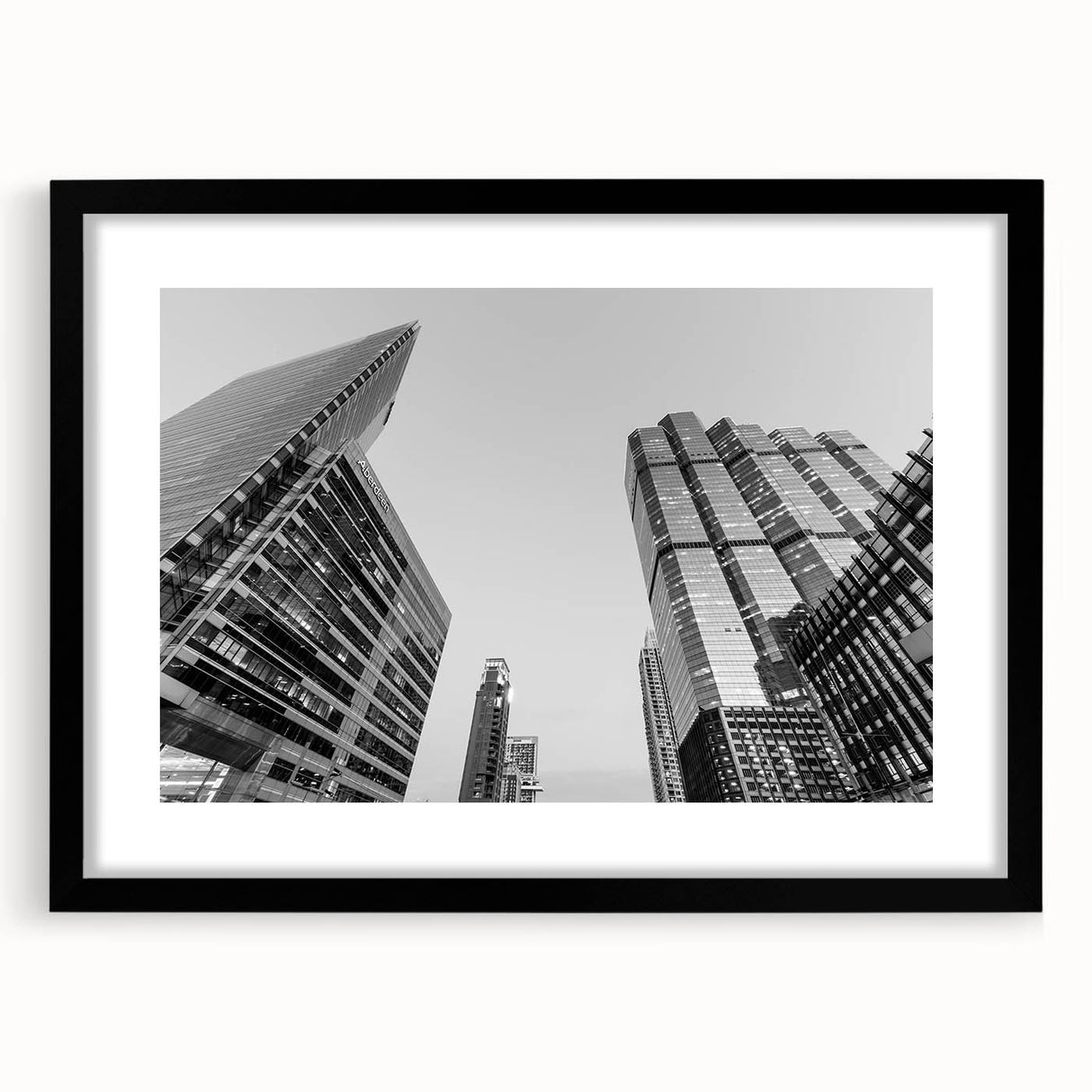 Abstract Atlanta skyline depicted in vibrant, colorful art on a large framed canvas, suitable for living room decor.