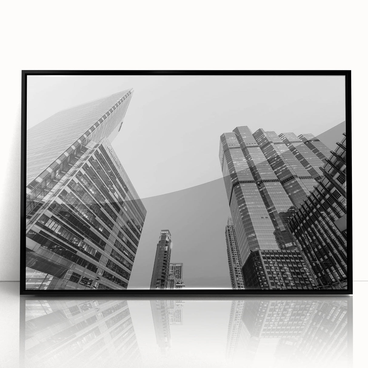 Large abstract wall art of Atlanta skyline in muted gray, framed in black acrylic, suitable for modern art wall decor.