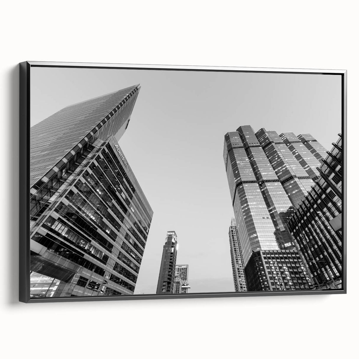 Black and white framed canvas of Atlanta skyline, ideal for bedroom wall decor, featuring vintage poster style.