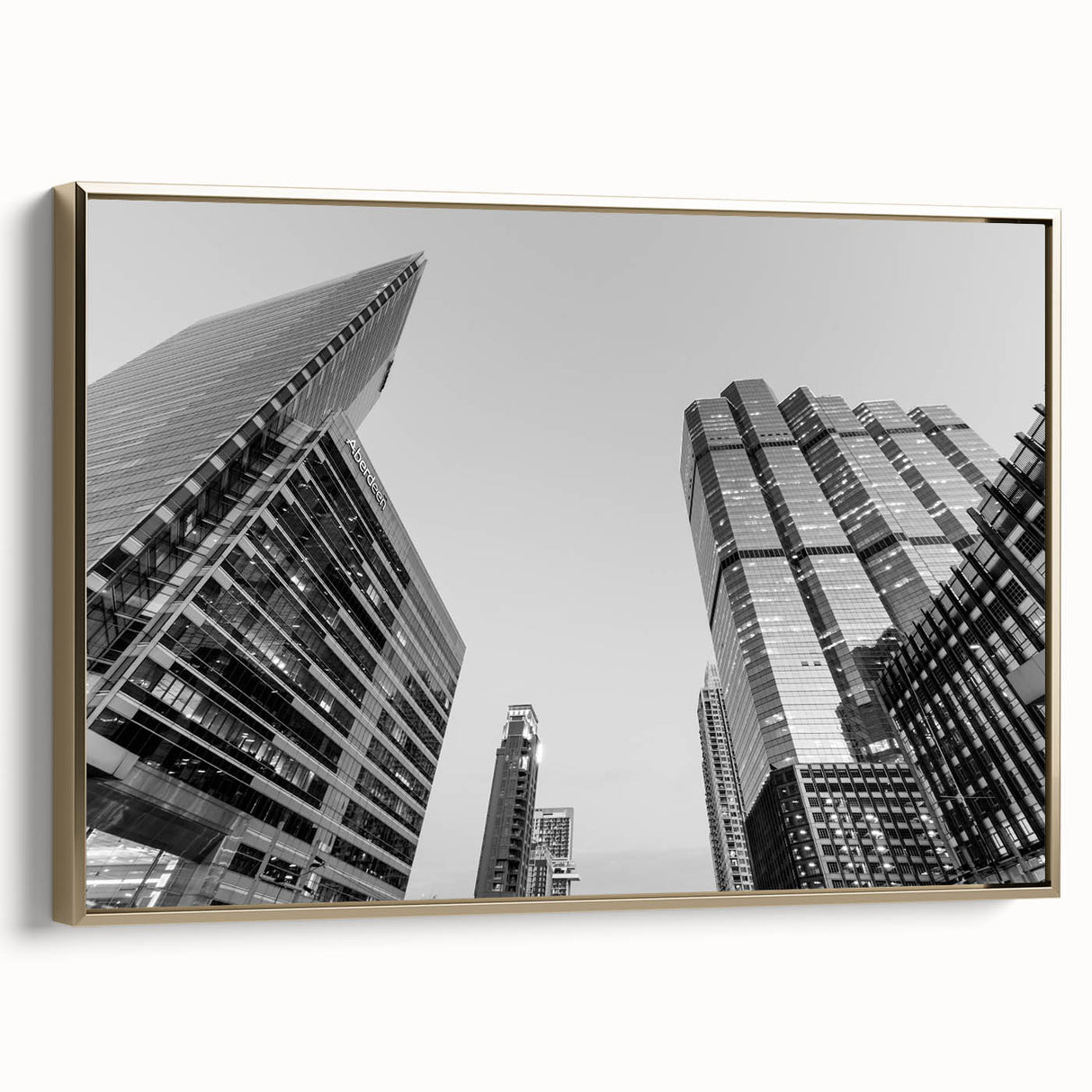 Framed canvas featuring a vintage-style Atlanta skyline in muted gold and black tones, ideal for bedroom wall decor.