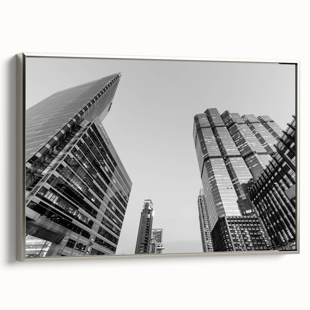 Landscape art painting of the Atlanta skyline in vibrant colors on a silver-framed canvas, ideal for office decor.