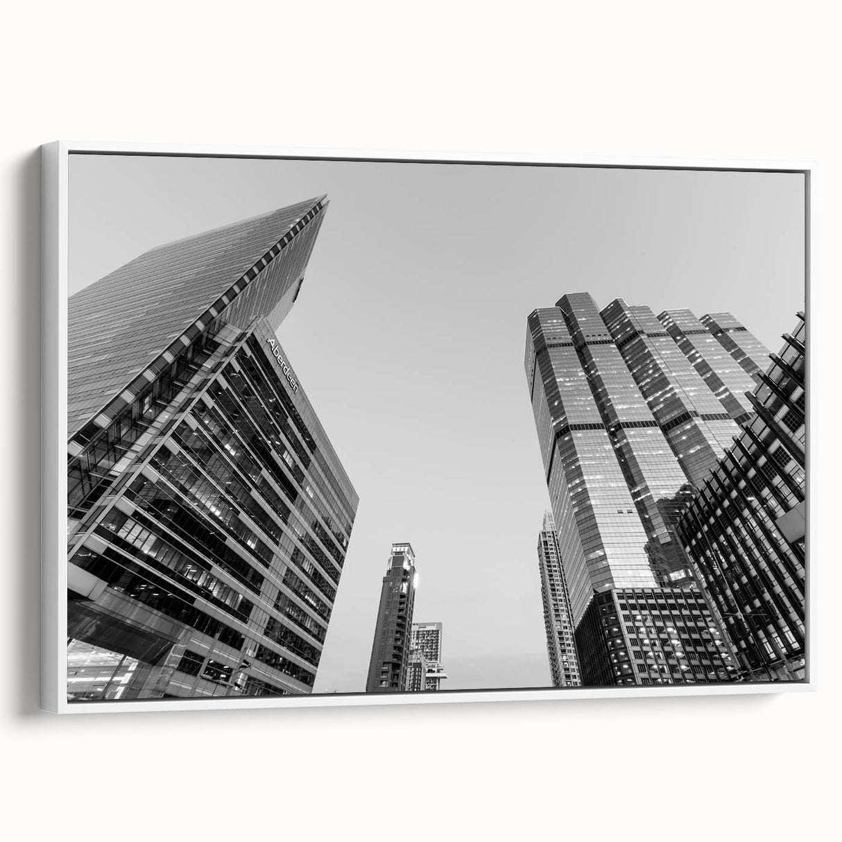 Vintage poster art of Atlanta skyline in vibrant colors on a large framed canvas, suited for living room decor.