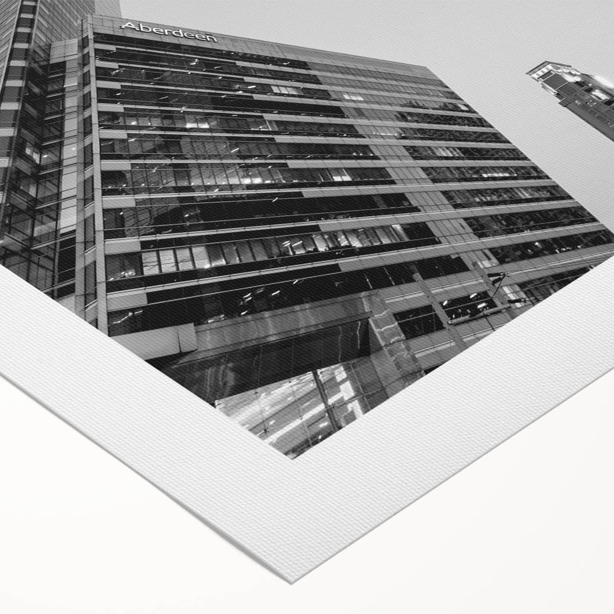 Art deco poster of Atlanta skyline in muted gray tones on rolled canvas, suitable for dining room wall art.
