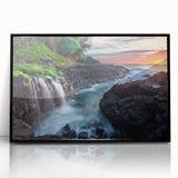 Large abstract wall art depicting Kauai, Hawaii in muted green and blue tones, framed in black acrylic.