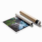 Rolled print of a Kauai, Hawaii scenery with lush greenery and vivid blue water.
