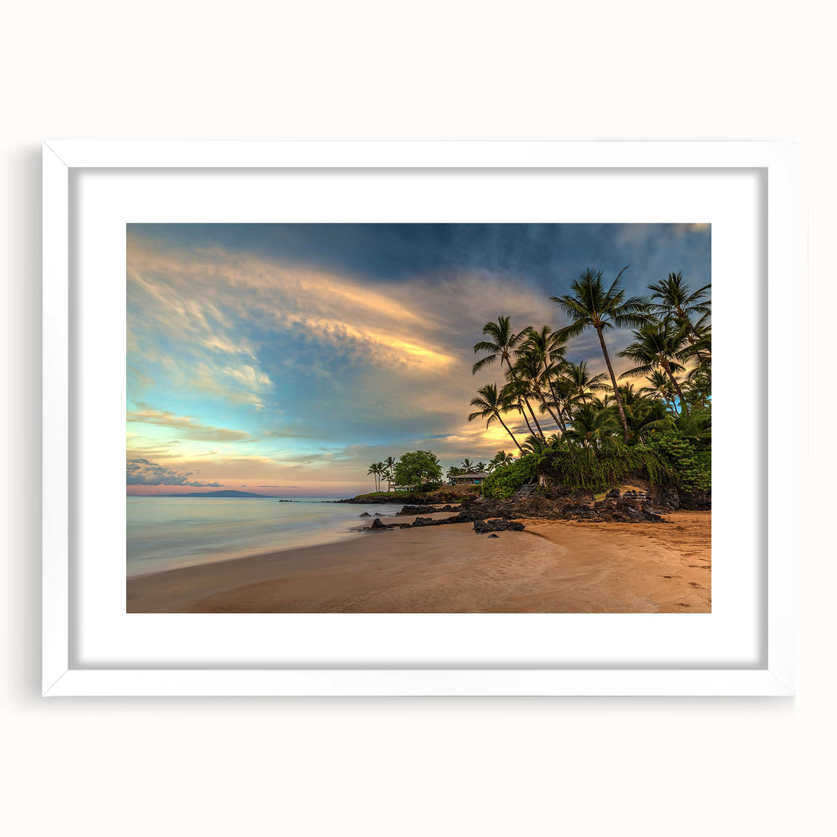 Abstract art print of Maui scenery in muted blue and green, framed with a white mat, ideal for dining room decor.