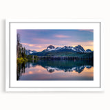 Abstract art print of Idaho scenery in muted earth tones, framed with a white mat, suitable for dining room decor.