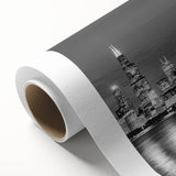 Art deco poster of Chicago skyline in monochrome shades on rolled canvas, suitable for nursery wall art or dining room decor.