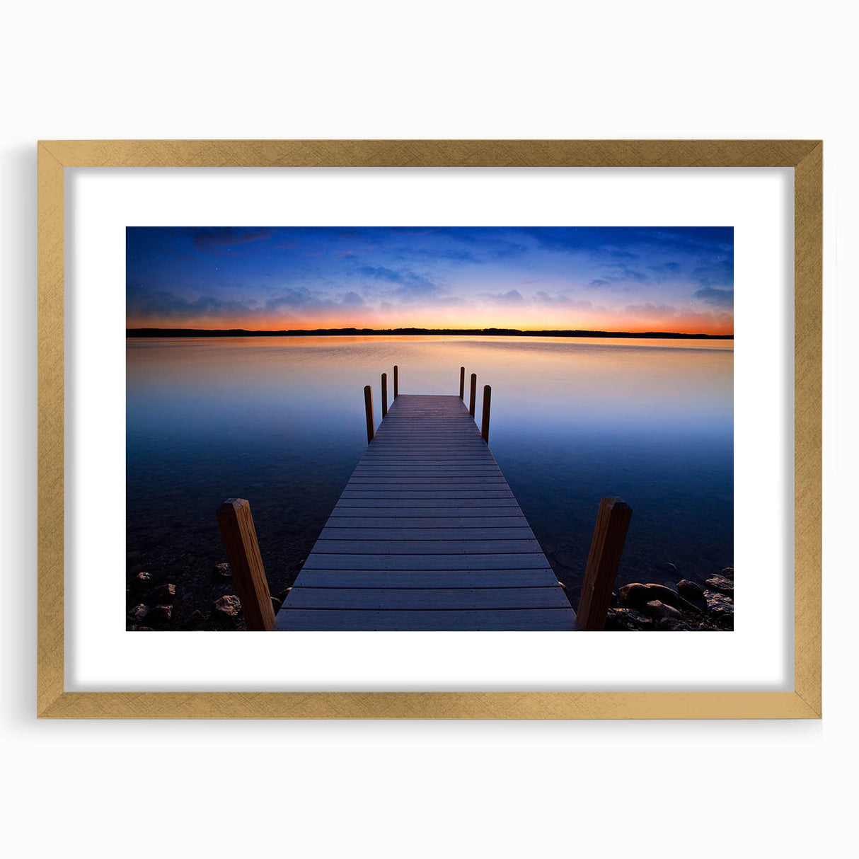 Extra large abstract art print of Lake Michigan, featuring textured blues and grays, in a gold frame.