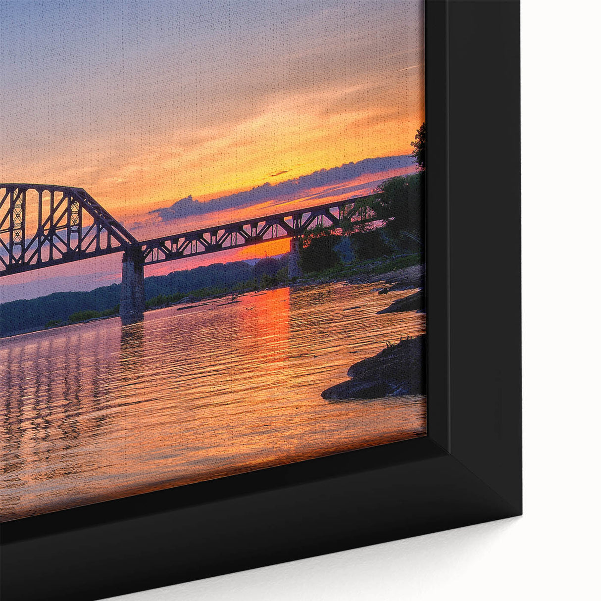 Close-up of textured black wall art depicting Indiana scenery, with colorful accents, on a framed canvas.