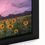 Close-up of textured black wall art featuring a colorful Kansas scenery on a framed canvas, ideal for living room decor.