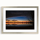 Textured art depicting abstract Louisiana scenery in muted earth tones on a framed silver mat, suitable for bedroom decor.