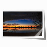 Extra large rolled print of a Louisiana landscape with soft floral elements in muted earth tones.