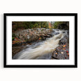 Colorful abstract art print of Acadia, Maine, in a black frame with mat, featuring a textured design.