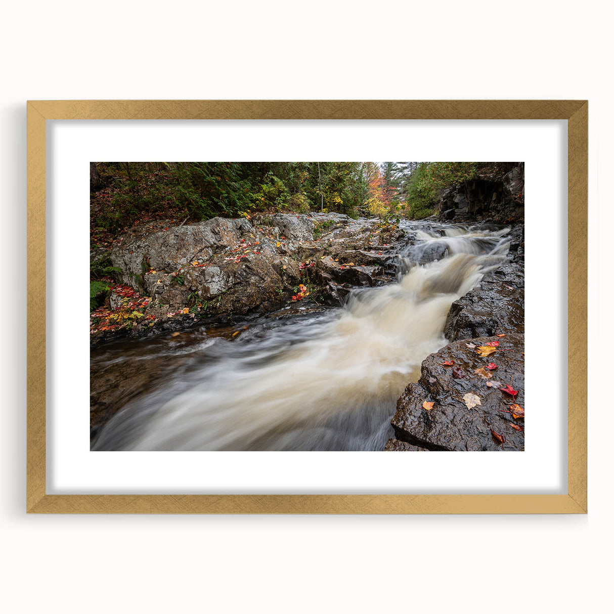 Extra large abstract art print of Acadia, Maine, in muted earth tones on a textured canvas, framed in gold.