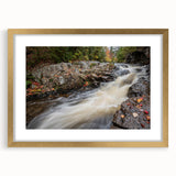 Extra large abstract art print of Acadia, Maine, in muted earth tones on a textured canvas, framed in gold.