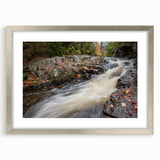 Textured art print of Acadia, Maine in abstract style, with muted earth tones on a framed silver mat.