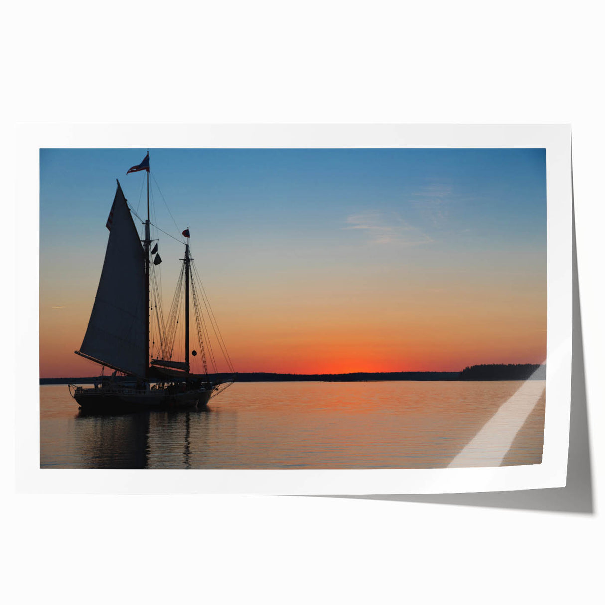 Rolled print of a scenic Maine landscape with vibrant green and blue tones, ideal for dining room wall art.
