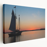 Large art depicting a serene Maine landscape on stretched canvas, with soft blue and green tones.