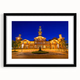 Extra large abstract art print of Baltimore skyline in colorful, textured style on a black framed canvas.