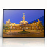 Large abstract wall art depicting the Baltimore skyline in muted gray and blue tones, framed in black acrylic.