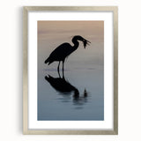 Textured abstract art print of Chesapeake Bay in muted blue and grey, framed in silver, suitable for bedroom decor.