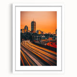 Abstract art print of Boston skyline in muted gray and blue tones on a framed white mat, ideal for dining room decor.