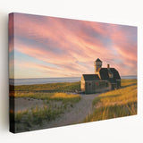 Large art depicting the Cape Cod coastline in muted blue and white tones on stretched canvas, ideal for kitchen wall decor.