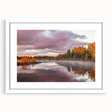 Abstract art print of Michigan's Upper Peninsula in muted earth tones on a white framed mat, ideal for dining room decor.