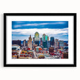 Extra large abstract art print of Kansas City skyline with vibrant, colorful textures on a black framed canvas.